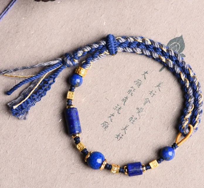 Hand woven DIY watch bracelet with lapis lazuli coloured rope and flexible wire in an ethnic style.