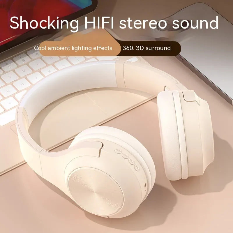 Creative head-mounted wireless Bluetooth headset in Ivory White colour on a charging bin.