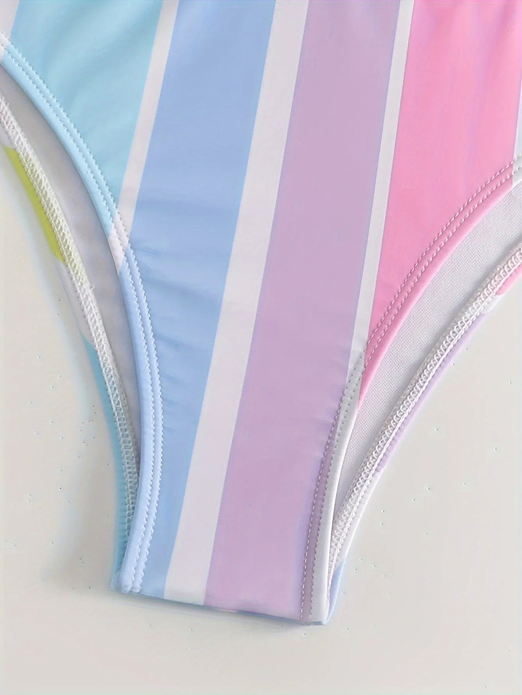 Women's striped sports bikini set with a top and briefs in a European/American pattern style.