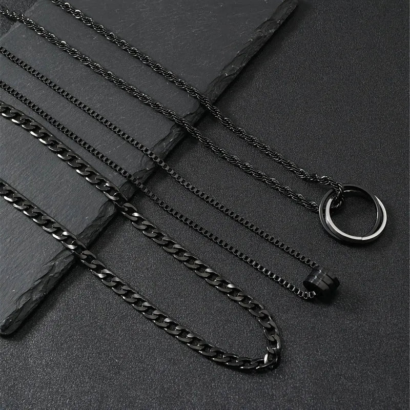 Men's black stainless steel necklace set with geometric titanium steel pendant.