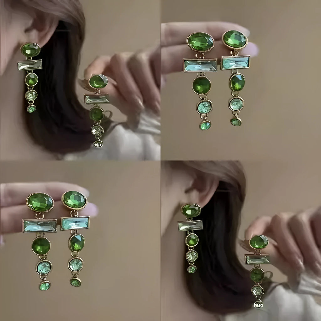 A pair of retro green gradient alloy earrings with a geometric tassel shape and inlaid zircon details.