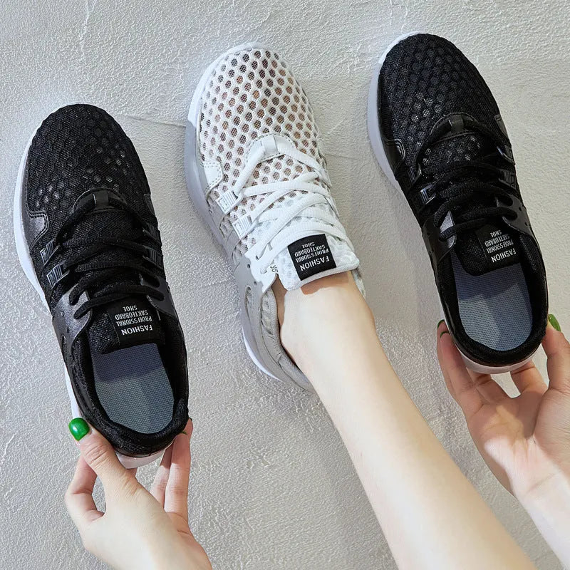 Breathable mesh casual sneakers with hollow-out design and round toe in black and white colour options