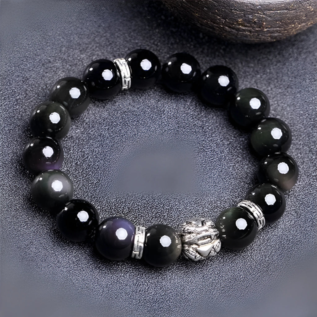Natural obsidian and silver 999 unisex bracelet in simple style, showing 12mm and 10mm size options.
