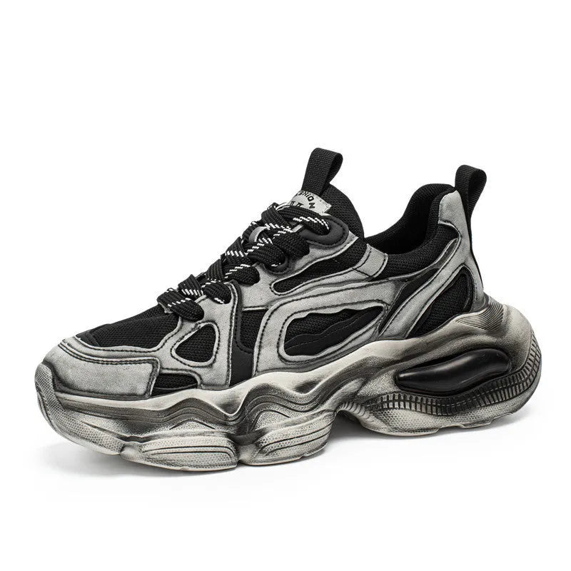 Men's black mesh sports sneakers with a platform sole and lace-up front, shown on a white background.