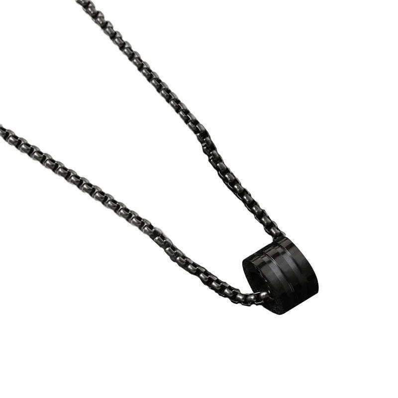Men's black stainless steel necklace set with geometric titanium steel pendant.