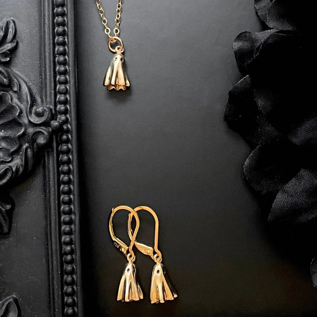 Ghost pendant necklace with titanium steel pendant on a stainless steel chain, showing chain style options.