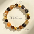 Handmade yellow crystal beaded bracelet with 10mm tower string beads on wrist