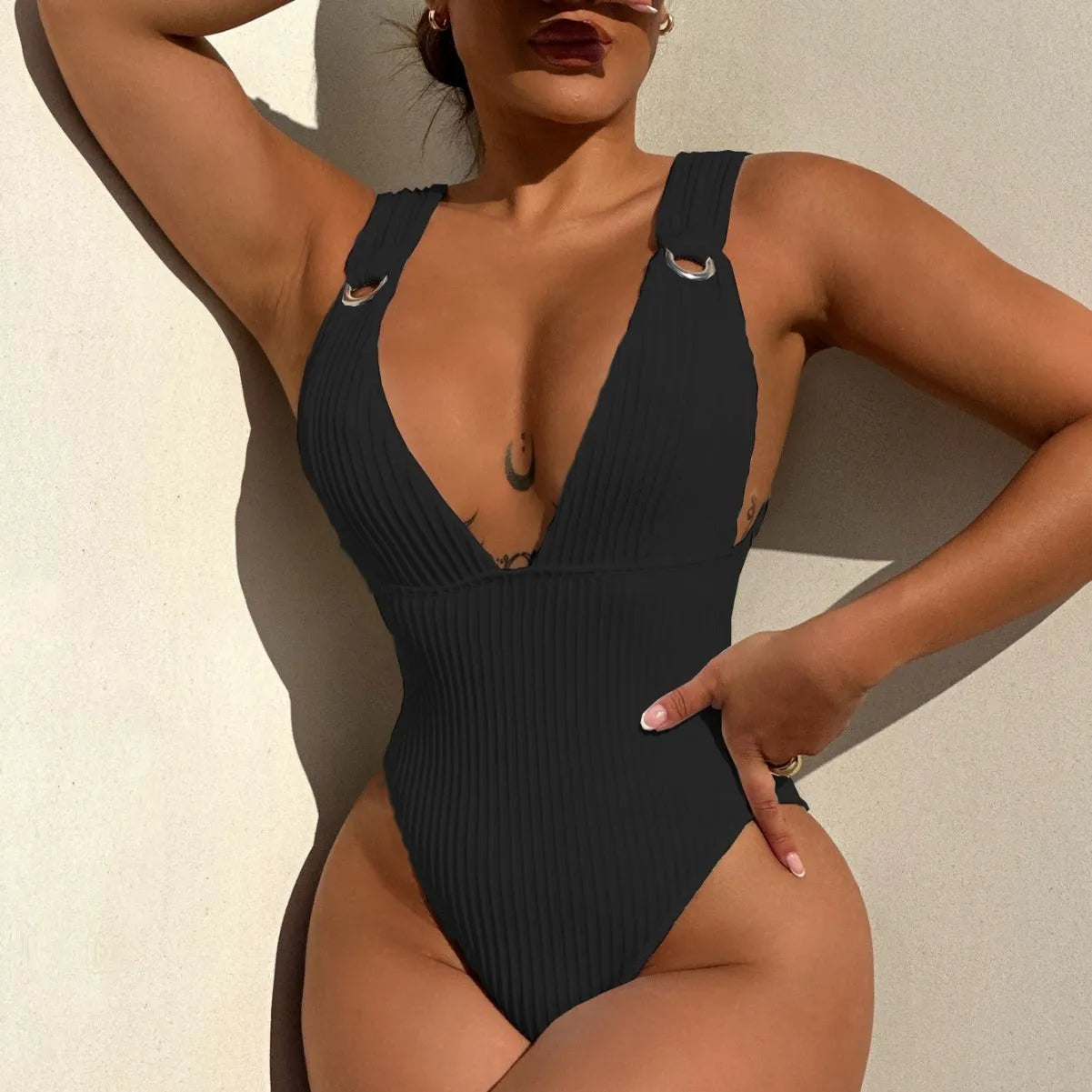 Women's solid colour one-piece swimsuit in black white green or orange with Spandex lining