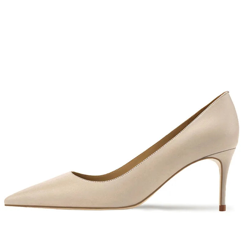 Women's black pointed toe high heel shoe with a fine heel and soft rubber sole