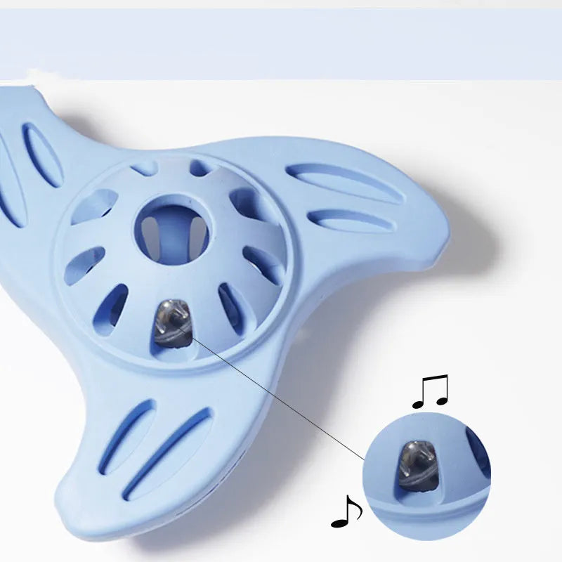 Blue bite-resistant boomerang dog toy with molar texture for large breed chewing.