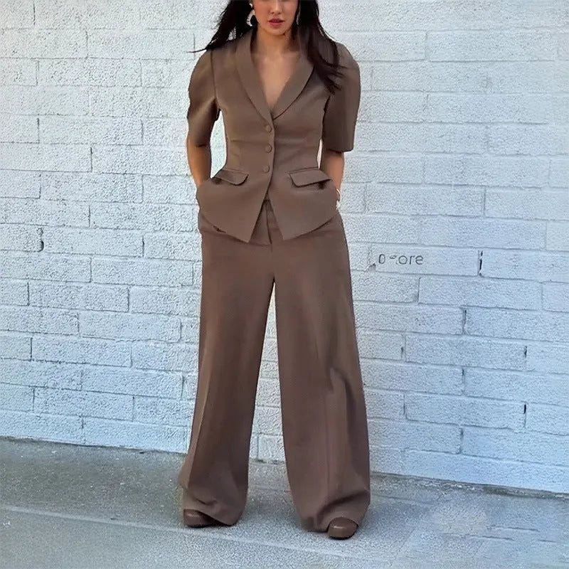 Brown men's slim fit two-piece polyester suit showing top with long sleeves and matching trousers