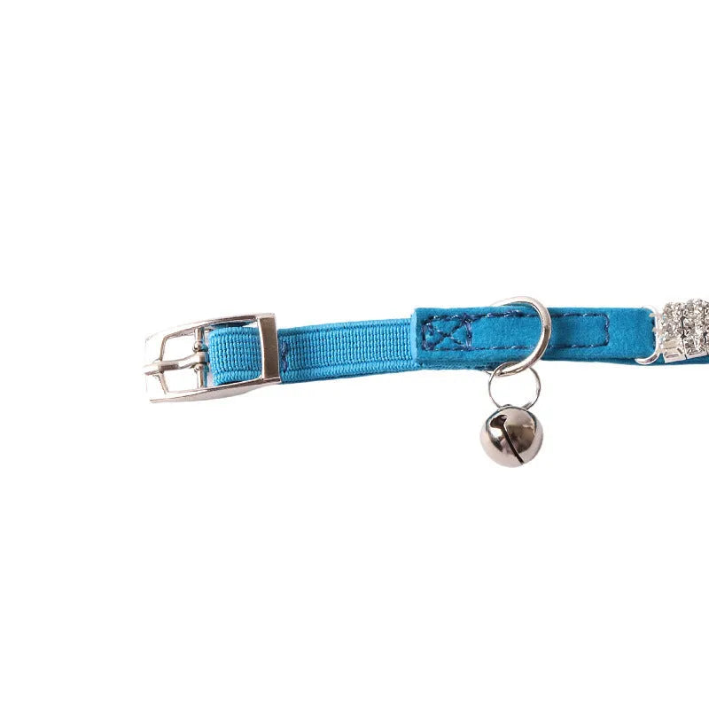 Flocked elastic buckle cat collar shown in multiple colours on a white background.