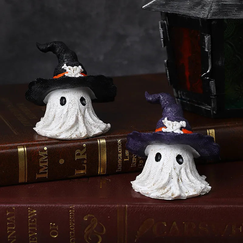 Purple and black resin wizard hat Halloween ghost ornament for holiday decorating.