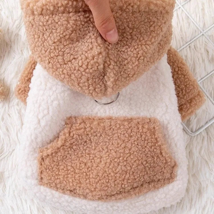 Brown pet hooded cotton-padded coat on a dog with thickened winter padding and full hood