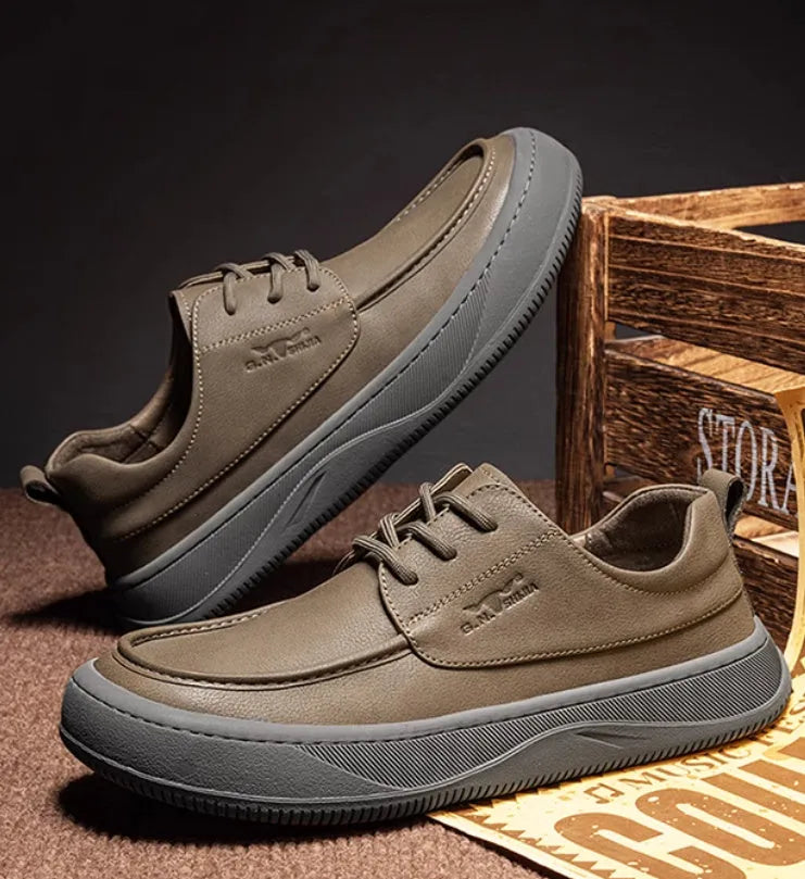 British retro style brown leather casual shoes with big toe design on a white background.