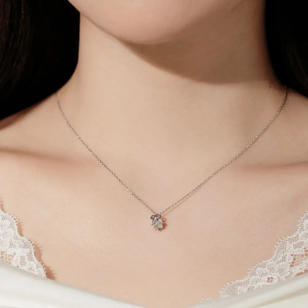 S925 sterling silver necklace and earring set with bear animal pendant on display, gold electroplated finish