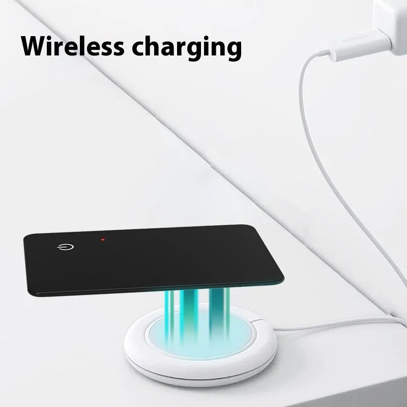 Black pet tracking device with wireless charging and NFC features measuring 85mm by 54mm