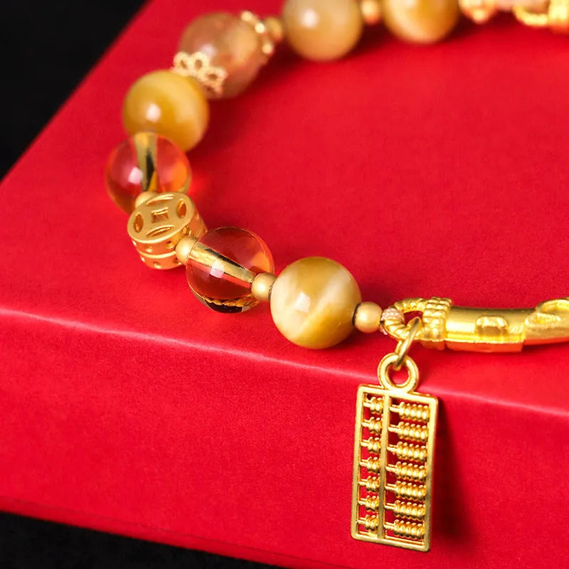 Women's abacus tag bracelet with tigereye and citrine gemstone beads and copper diamond charm