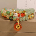 Peacock green agate double ring bracelet with safety buckle pendant and rhinestone detailing