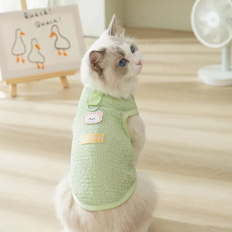 Hollowed-out knitted cat clothes with bear patch in blue, green, yellow colours