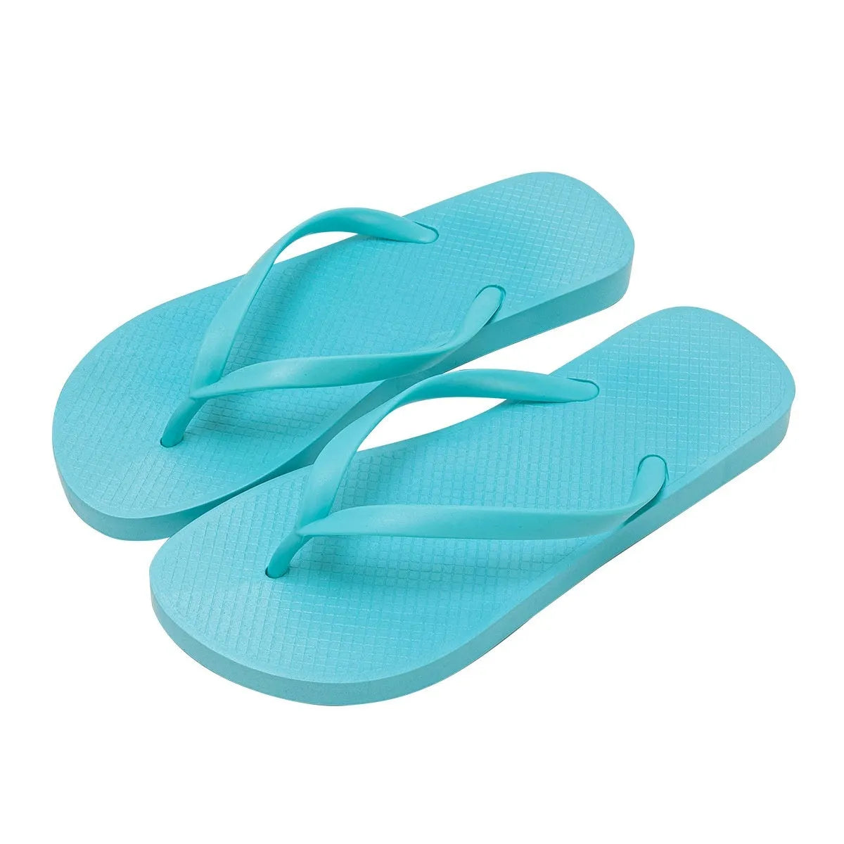 Orange foldable plastic beach slippers with non-slip patterned soles and hollow-out uppers.