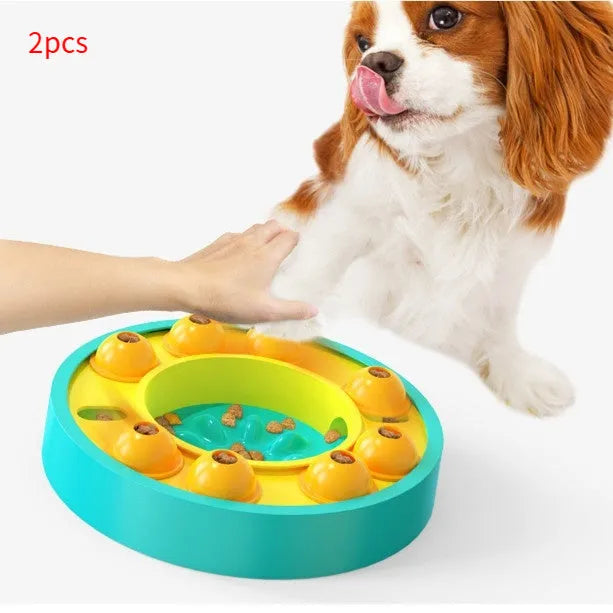 Lake blue interactive dog slow feeder bowl with central column and food turntable on a floor.