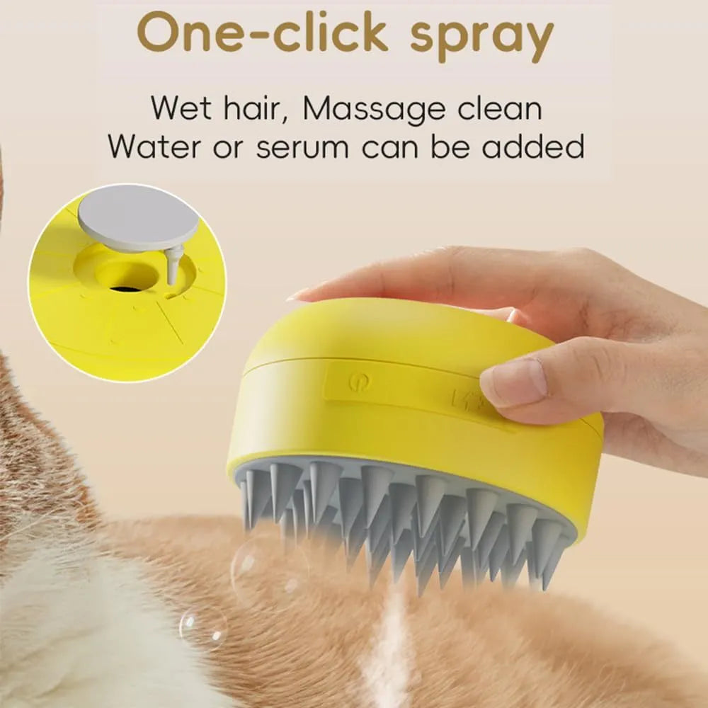 Green and yellow rechargeable silicone steam brush for grooming cats and dogs on a table.