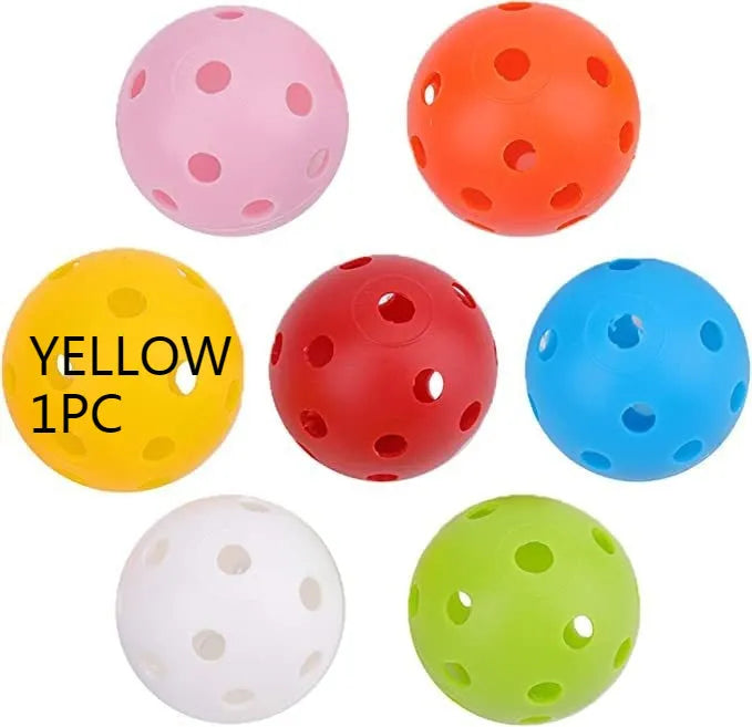 Multi-colour golf practice balls with a 26-hole target mat, stored in a net pocket.