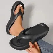 Women's thick-soled EVA flip-flops in black, white or grey with non-slip patterned soles