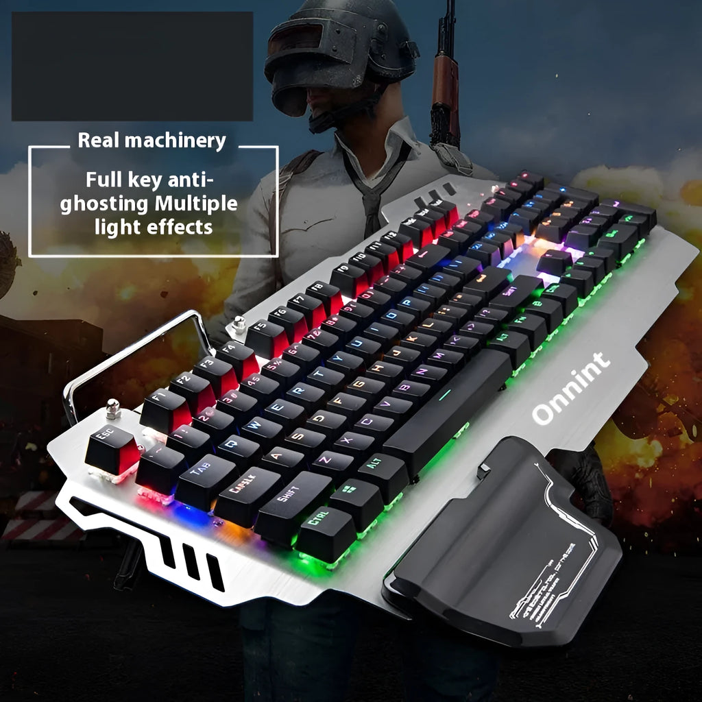 Silver metal panel professional gaming keyboard with wrist splint accessory on desktop