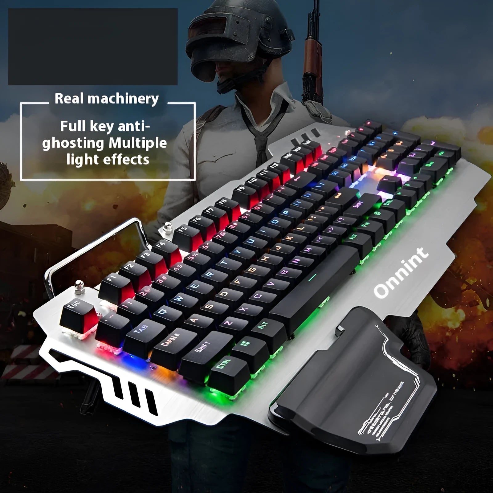 Silver metal panel professional gaming keyboard with wrist splint accessory on desktop