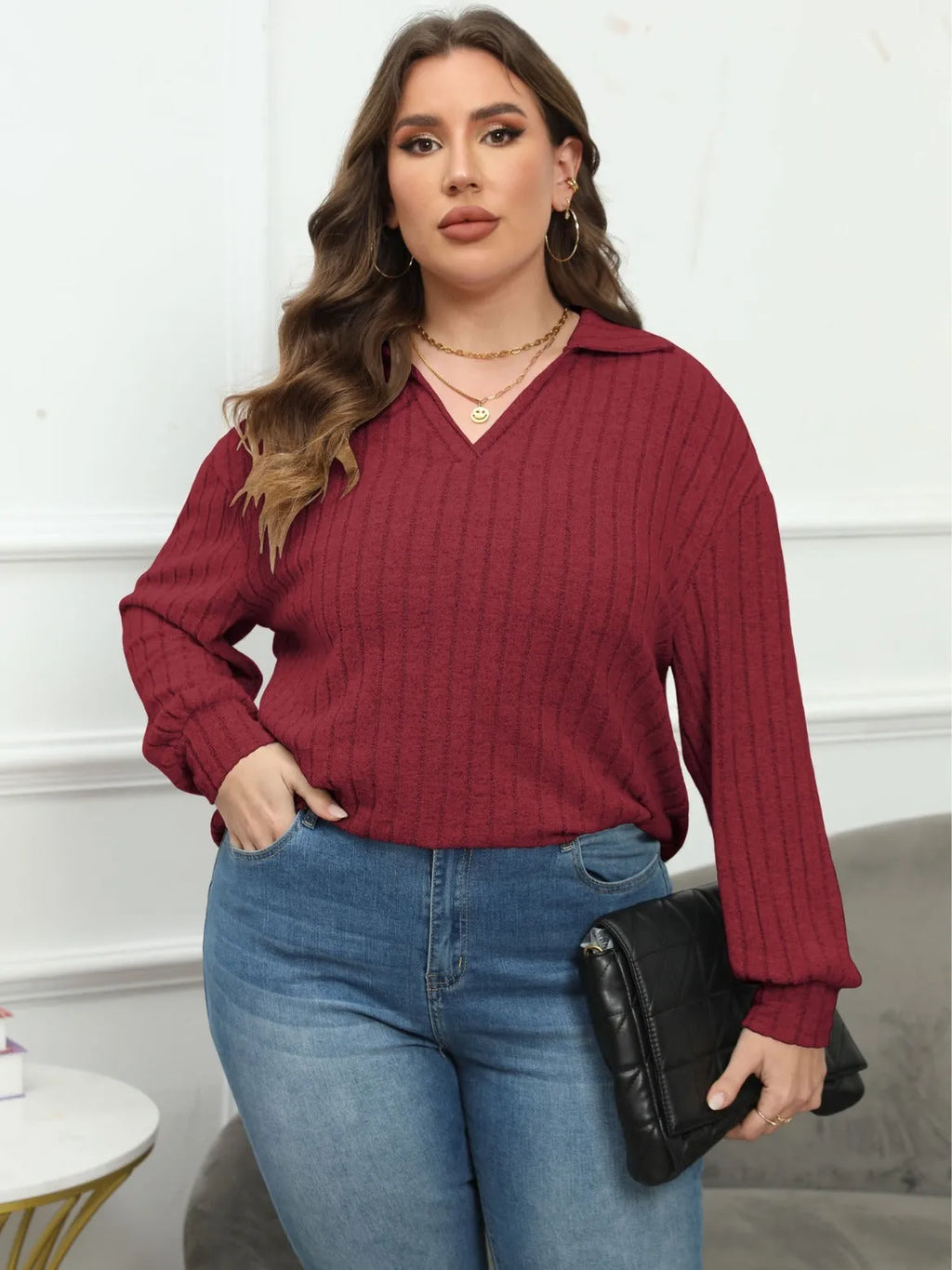 Plus size women's grey polo collar shirt with lantern sleeves in a street fashion style.