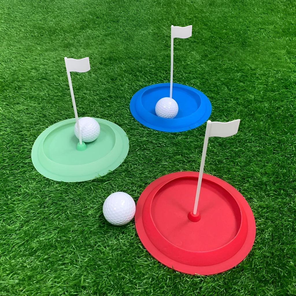 Rubber putter plate with 16cm diameter hole for indoor golf putting practice, shown in green.