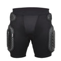 Black cycling hip protection pants with integrated pad, shown laid flat.