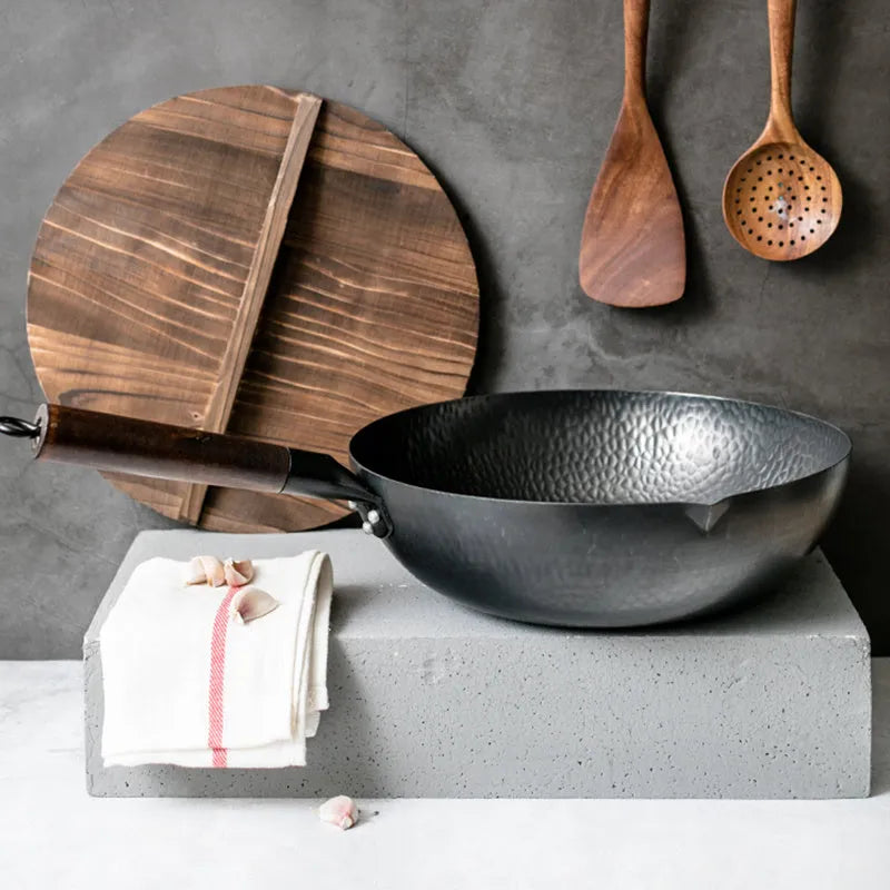 Traditional black iron wok measuring 40cm with wooden handle and glass lid option