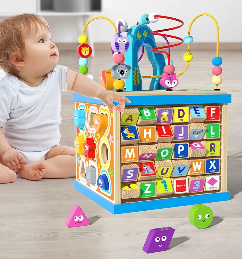 Blue wooden bead treasure box toy with multiple play scenes and bead runs, dimensions 23x23x32cm