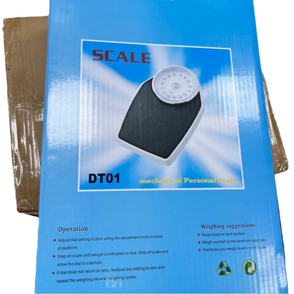 Black mechanical body weight scale with large analogue dial on a simple platform.