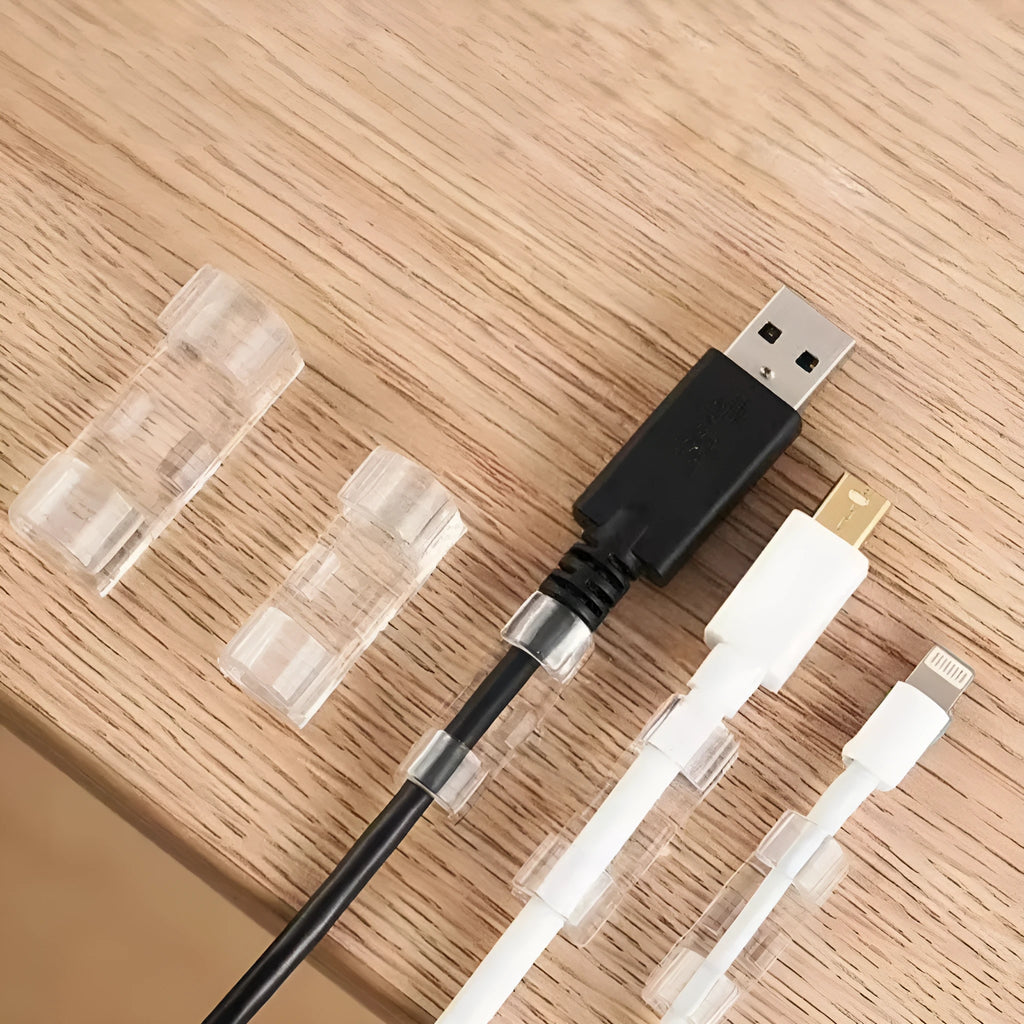 Transparent plastic self-adhesive cable clips for wire organisation in four sizes
