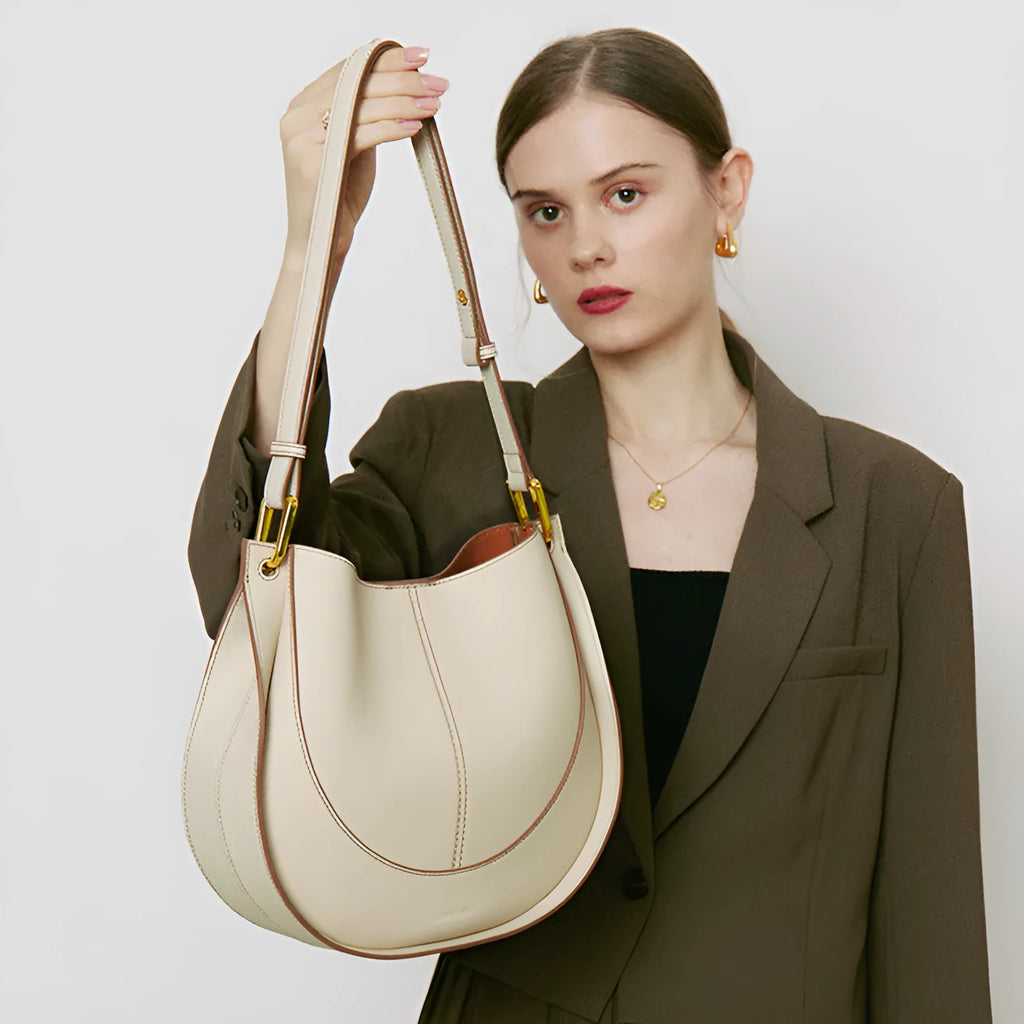 Designer small crossbody bag for women in genuine top grain leather with retro splicing detail