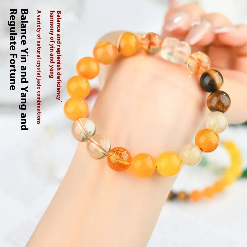 Handmade five elements crystal bracelet with geometric beads in gold, wood, water, fire, or soil colours.