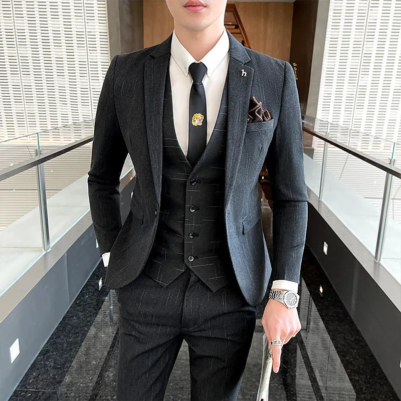 Men's slim fit suit in black and dark grey, cotton blend fabric, business formal wear set.