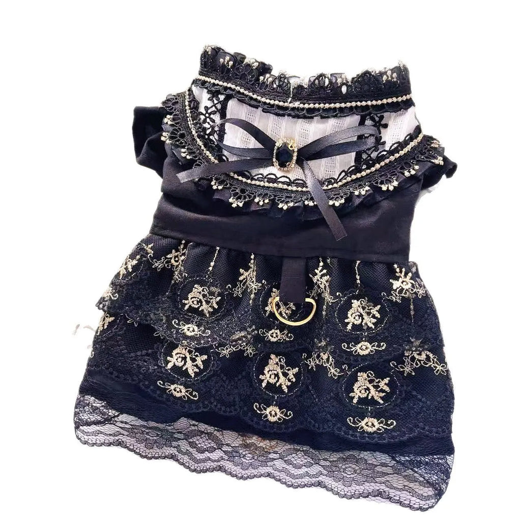 Golden Gothic princess-style skirt pet clothing for a small dog or cat on a mannequin.