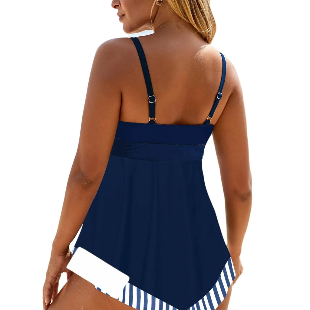 Plus size green two-piece bikini swimsuit with backless design on a mannequin.