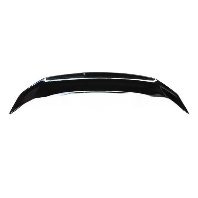 Universal punch-free car spoiler tail wing in ABS plastic on a vehicle.