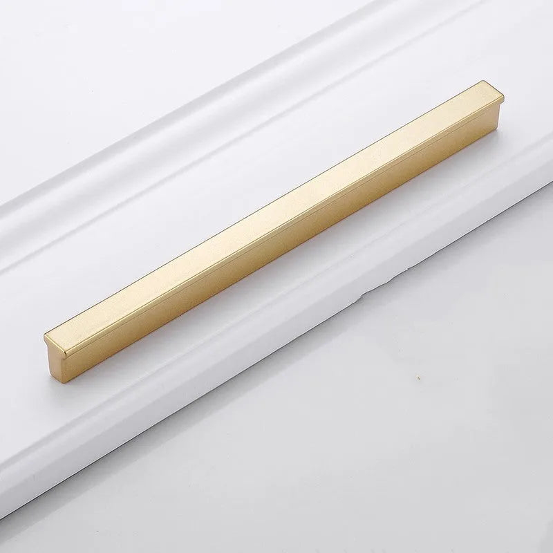 Gold aluminium alloy T-shaped open cover cabinet door handle for single hole mounting.
