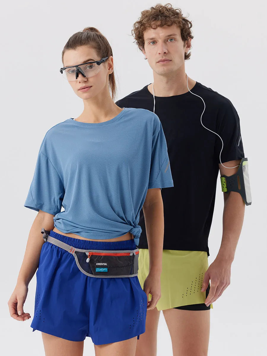 Men's straight-leg nylon sports shorts with side slits in turmeric yellow, night blue, and black.