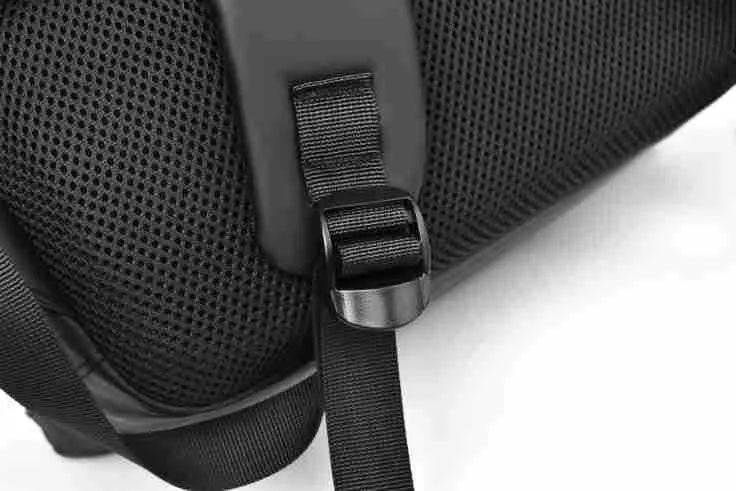Large black waterproof PU leather computer backpack with simple design and sewing thread detailing
