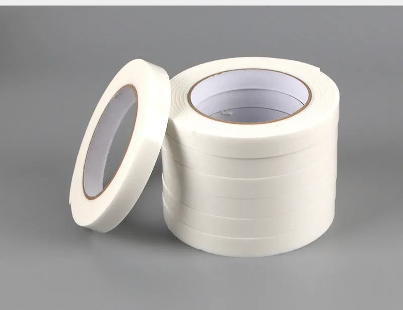 Foam double-sided adhesive tape roll showing 3mm thickness with measurements for 15mm, 18mm, and 30mm width options