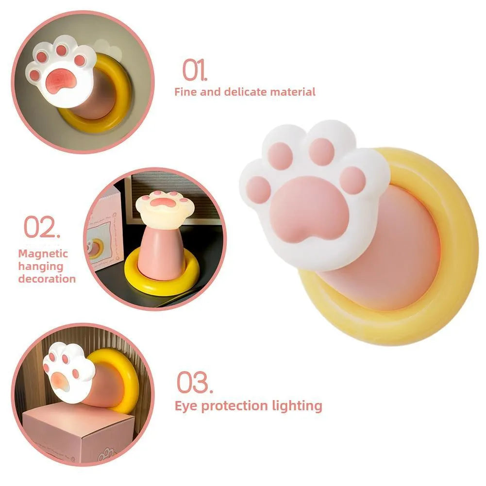 White cat paw shaped rechargeable touch control bedside lamp with dimmable light.