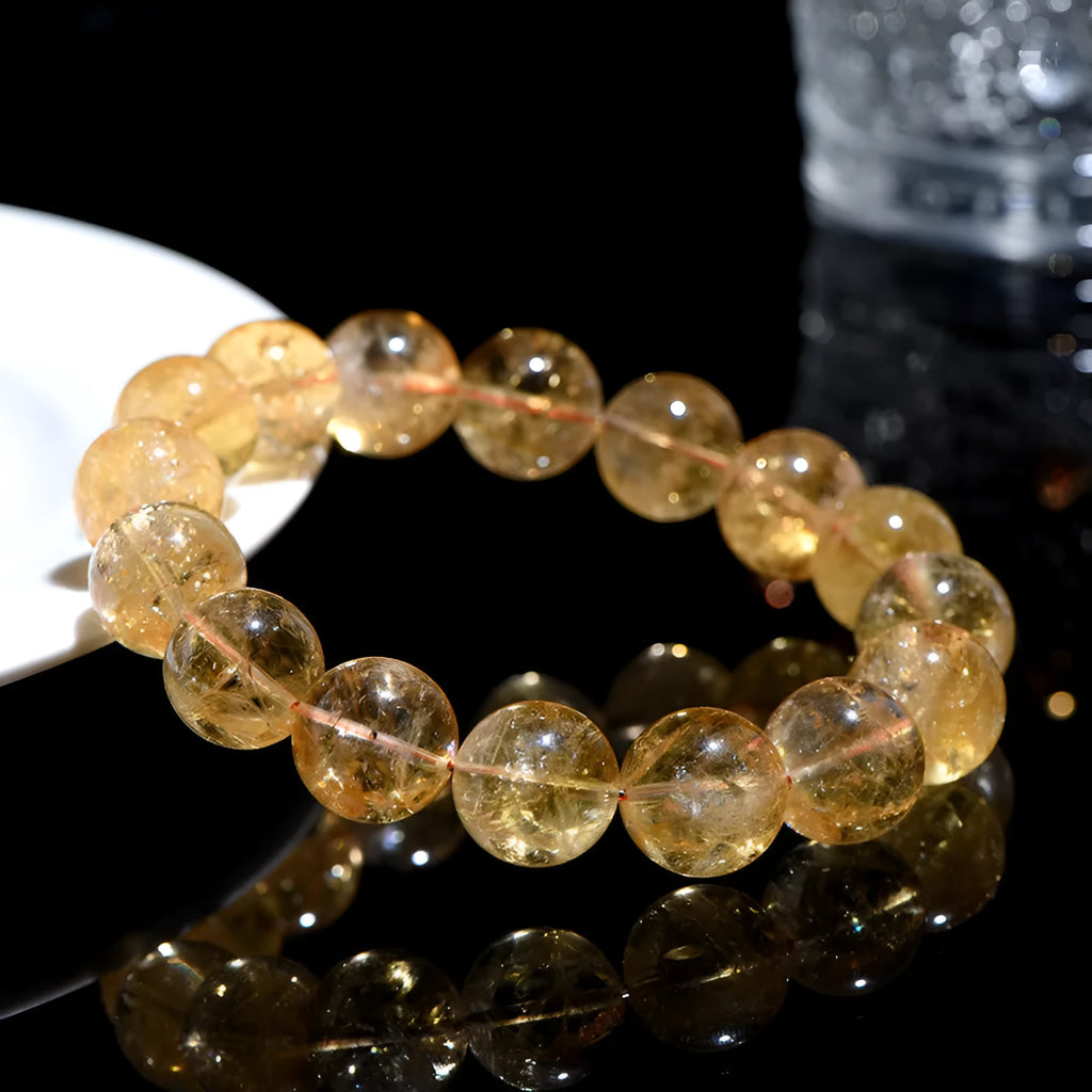 Natural yellow citrine bracelet with spherical beads in Brazilian yellow and violent yellow colour options